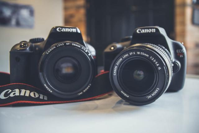 Photo of two Canon EOS Rebel T3 cameras.